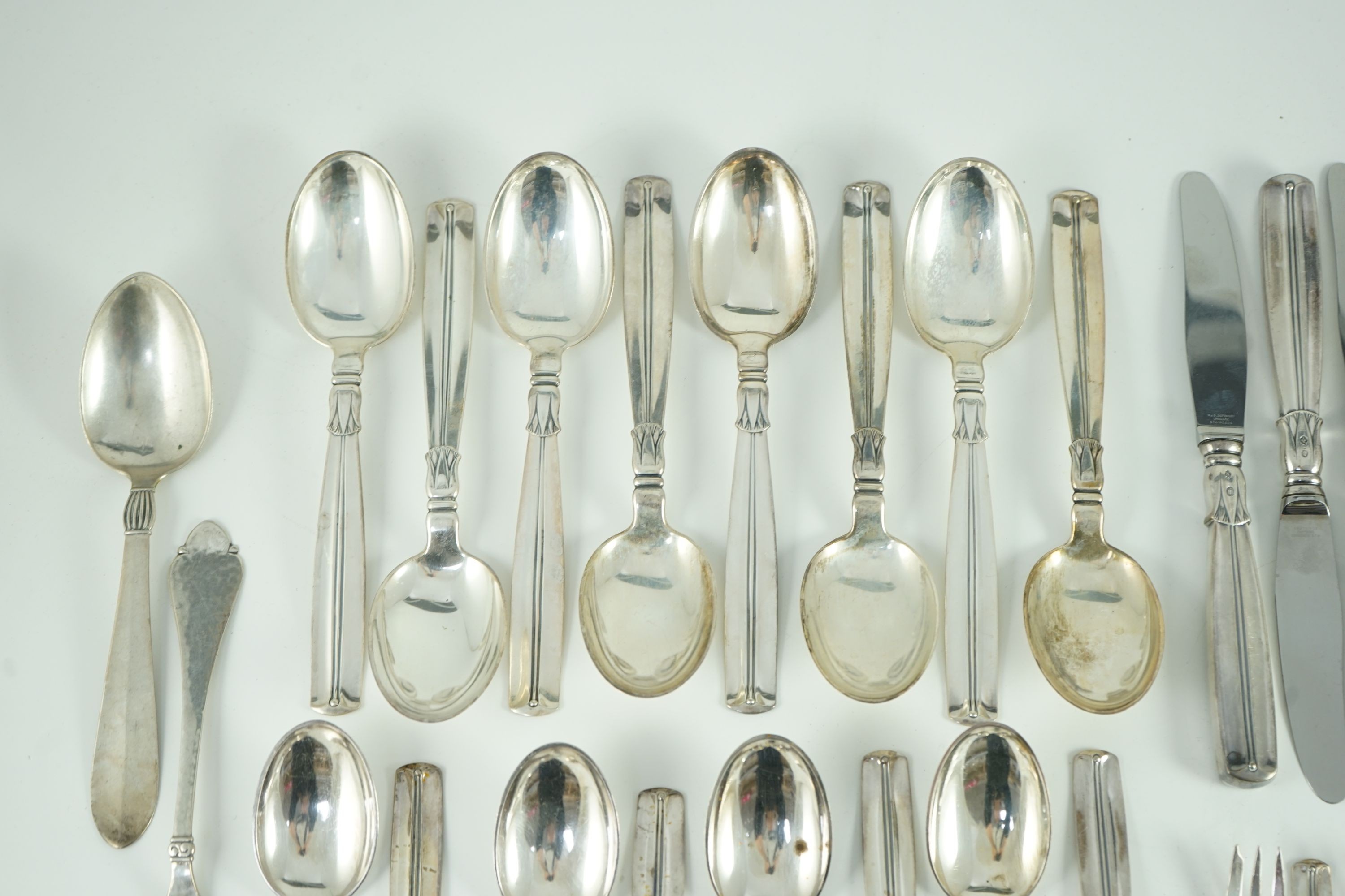 A mid 20th century harlequin part canteen of Danish 830 standard flatware by Broderne, W & S Sorensen